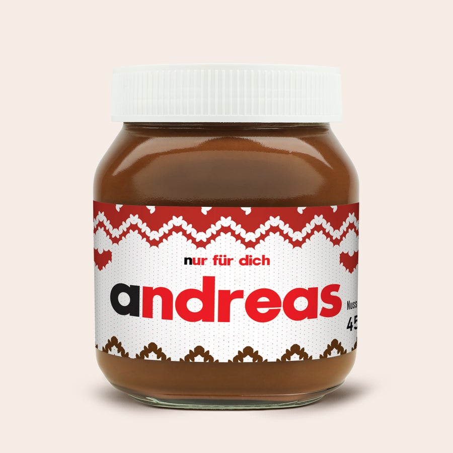 Personalisiertes nutella®-Glas Personalisiertes nutella® Glas mit weißem Deckel und rotem Strickmuster, bedruckt mit dem Namen Andreas