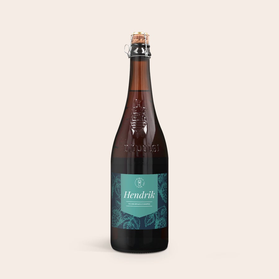 Personlig öl La Trappe Isid'or Brun ölflaska La Trappe Quadrupel med personlig fotolabel, tryckt med namnet "Hendrik" och texten "TILL DEN SÖTASTE STYVPAPPAN"