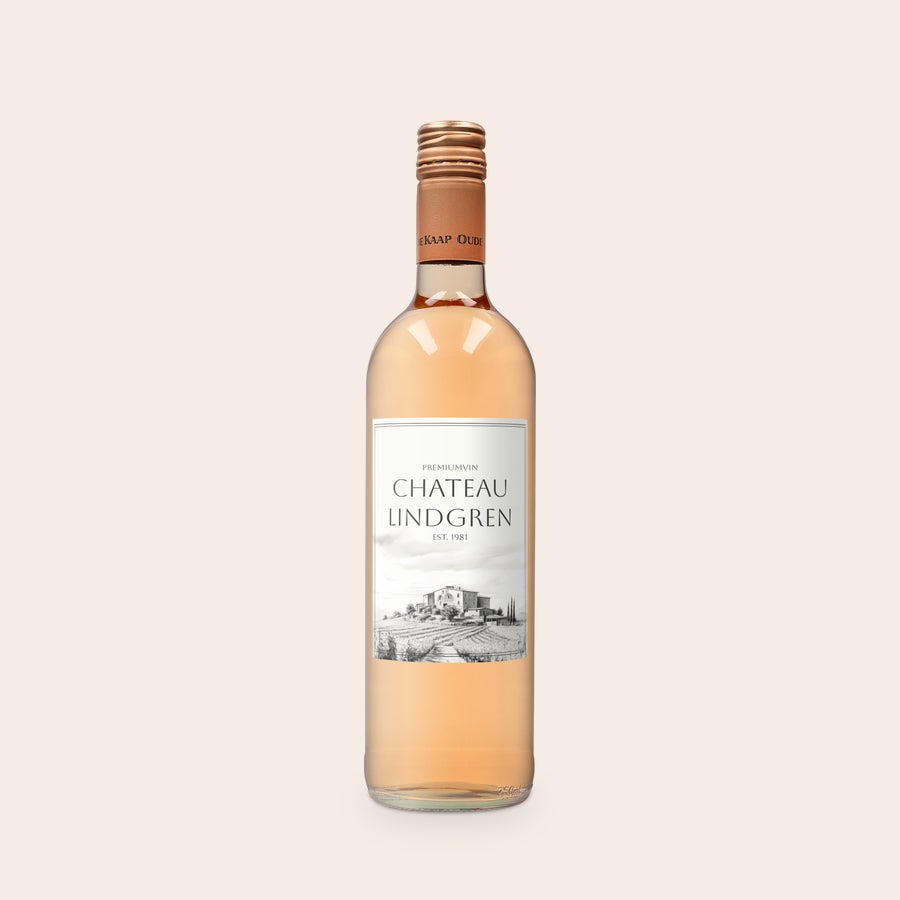 Personligt vin Oude Kaap Rosé Oude Kaap rosévin med en personlig etikett med namnet Chateau Lindgren och en illustration av en vingård, perfekt att överraska med.