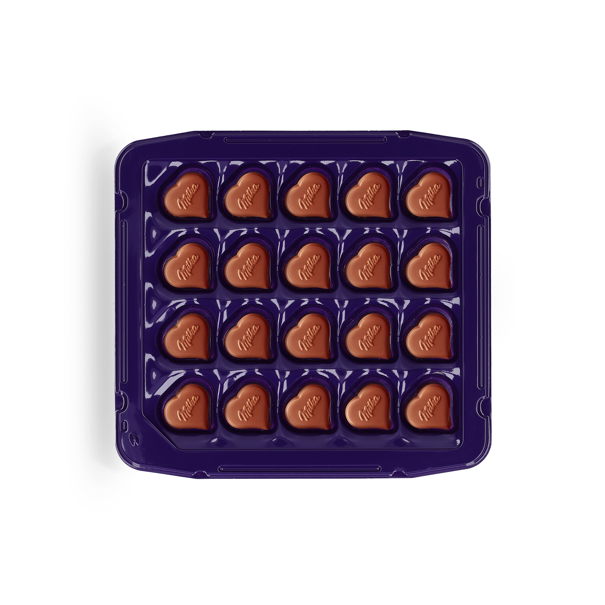 Fialová dárková krabička Milka s 20 srdcovými pralinkami, s nápisem Milka na každé pralinkce.