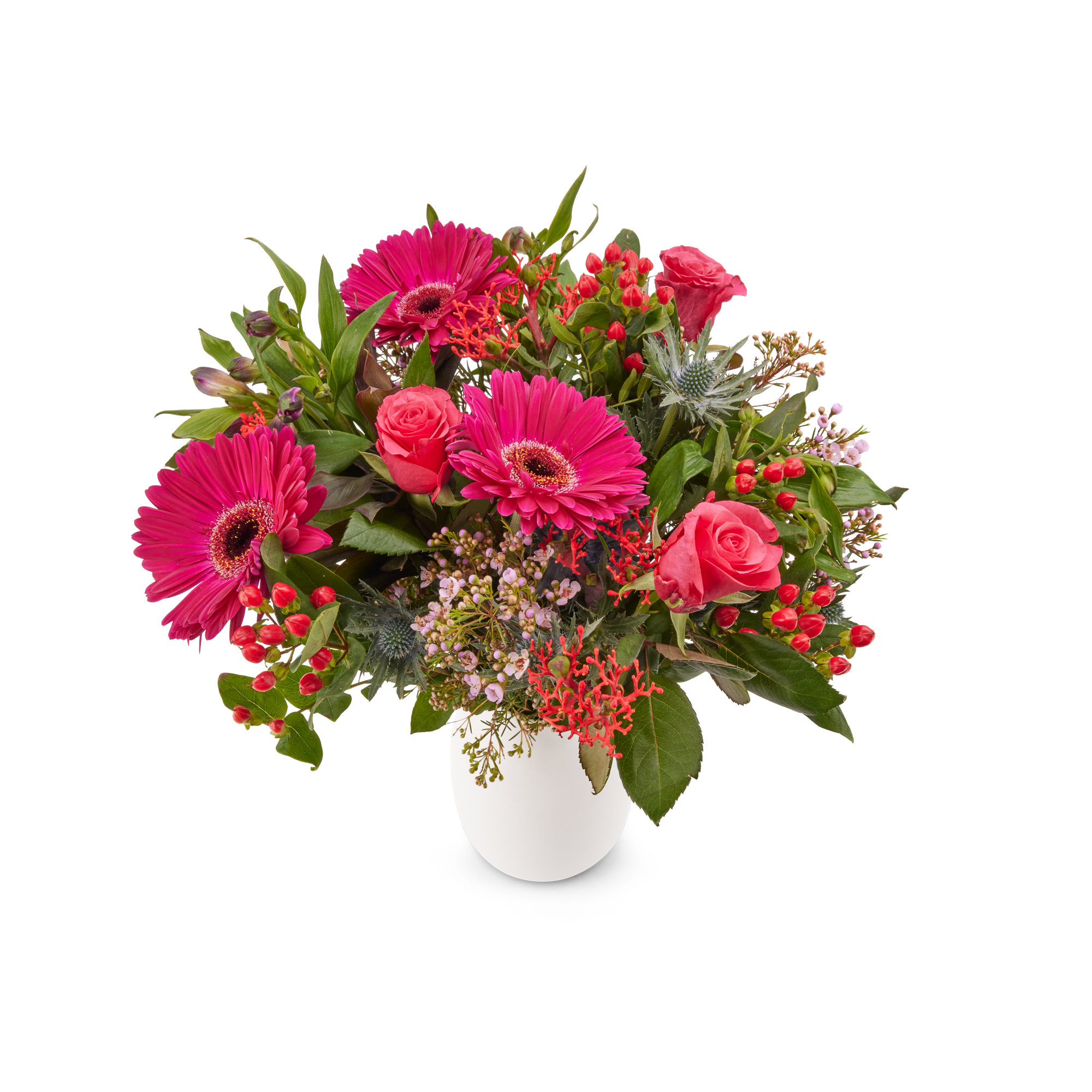 Prachtig boeket paarse bloemen met roze rozen en rood koraal op een witte vaas, inclusief gratis cadeaukaartje.