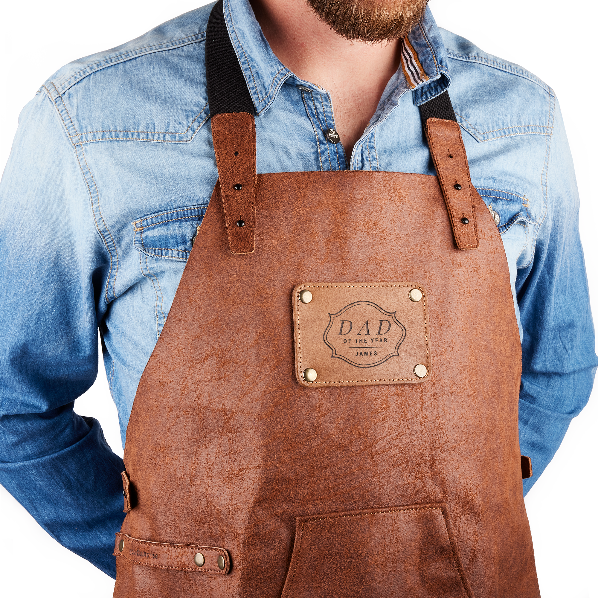 Sustainable leather apron with name for dad, engraved with Dad of the Year James on the chest.