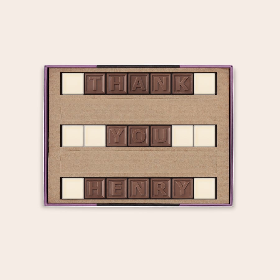 Chocotelegram® Personalizowana czekolada z napisem THANK YOU HENRY, mleczne litery, białe spacje, zaskocz swoich najbliższych wiadomością ukrytą w czekoladzie