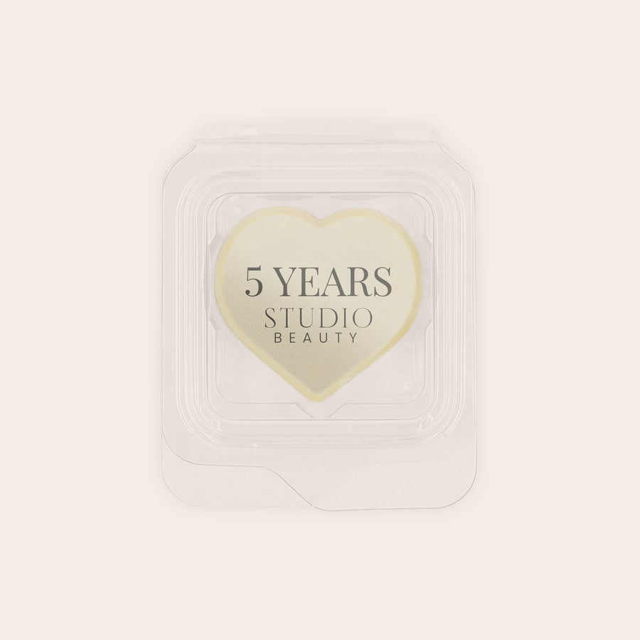 Personalised photo chocolates - Individually wrapped Heart-shaped praline favour printed with "5 YEARS STUDIO BEAUTY" logo, individually wrapped in clear plastic