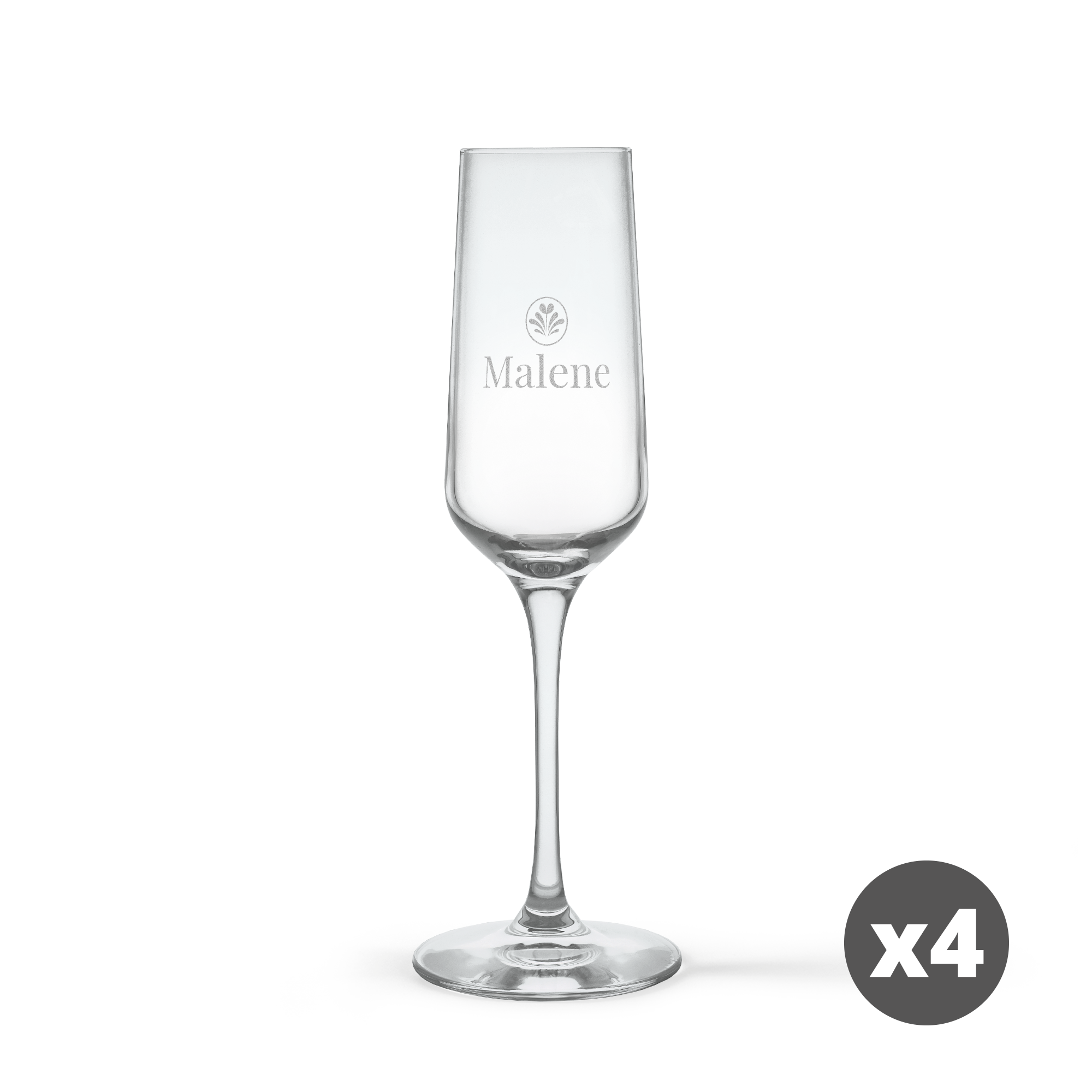 En skål med fire personlige krystallchampagneglass, hvert gravert med navnet Malene.