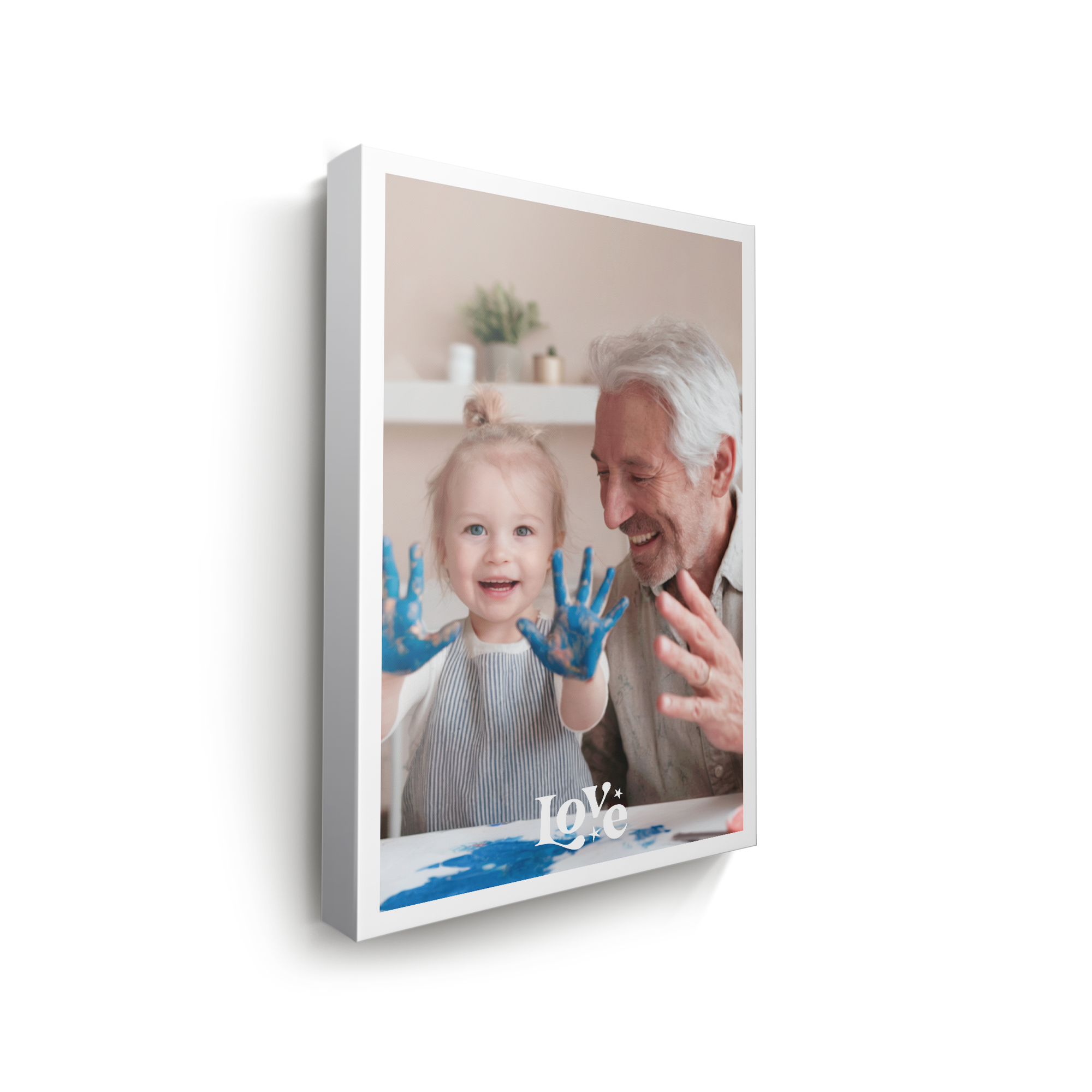 Personalized photo canvas printed with a photo of a toddler and grandfather, the word Love visible on the canvas.