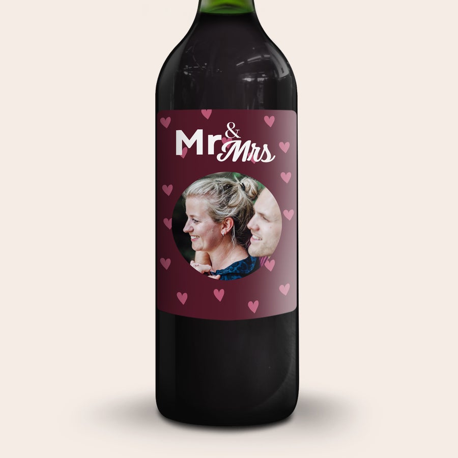 Gluhwein Engelsglut Botella de glühwein personalizada con foto de pareja, "Mr & Mrs" y pequeños corazones rosados, ideal como regalo.
