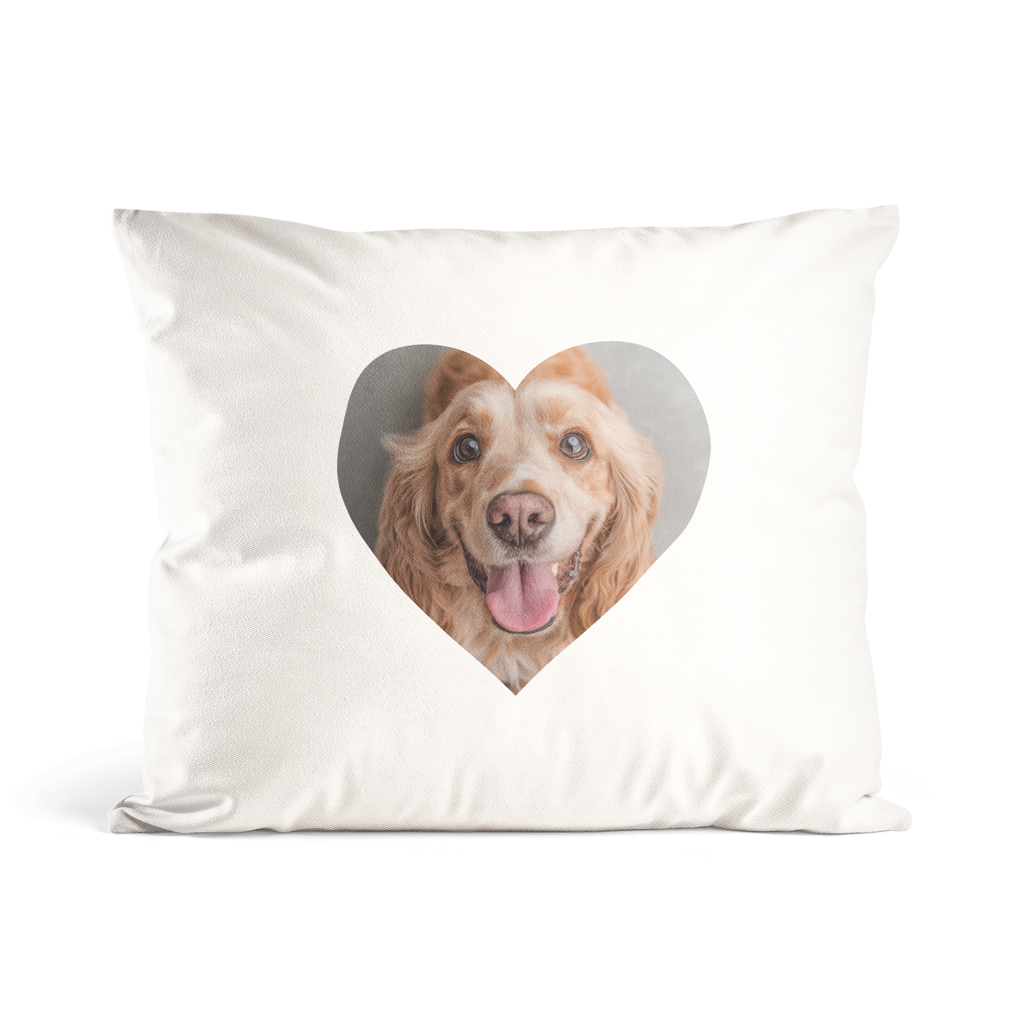 Cuscino personalizzato con la foto di un cane sorridente stampata a forma di cuore
