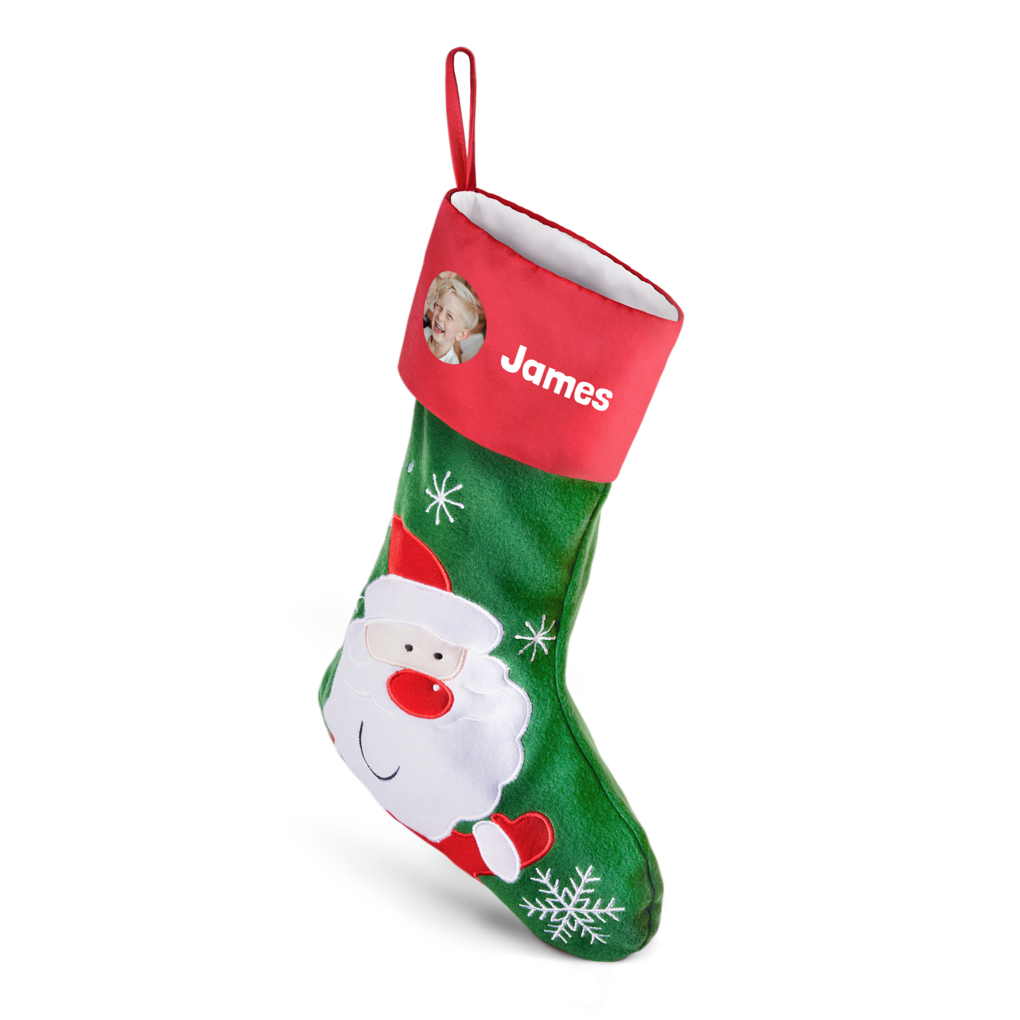 Grøn julesok med julemandsmotiv og snefnug, trykt med navn "James" og et billede af et barn