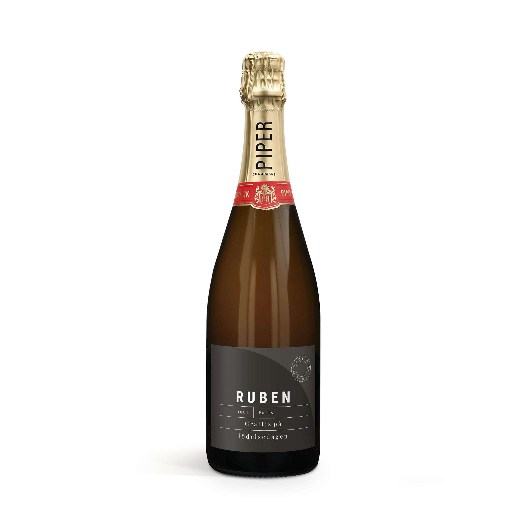 Piper Heidsieck Brut champagneflaska med en personaliserad etikett textad med Ruben och Grattis på födelsedagen
