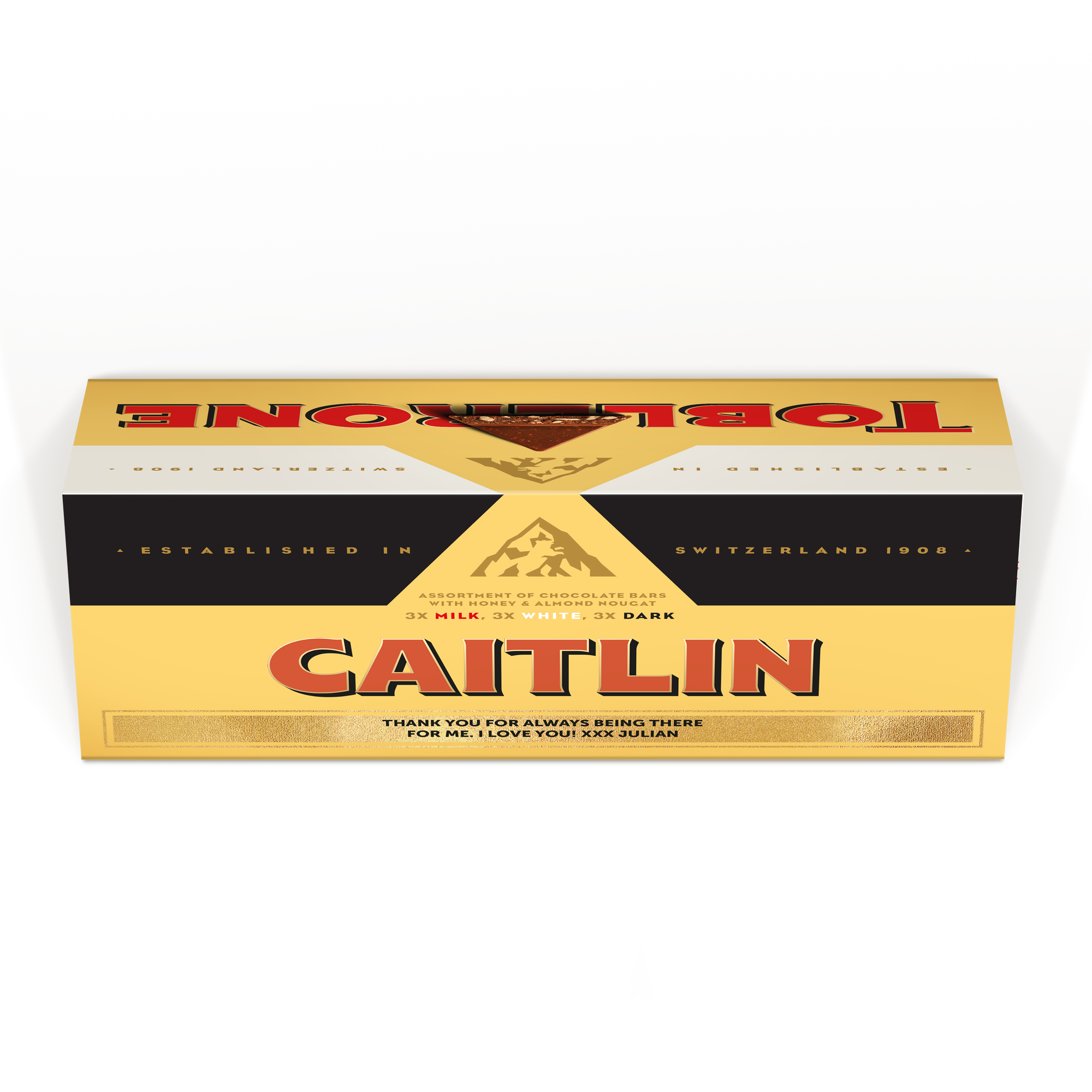 Esta barra de chocolate personalizada XL Toblerone Selection em embalagem amarela e preta, impressa com o nome "Caitlin" e uma mensagem pessoal.