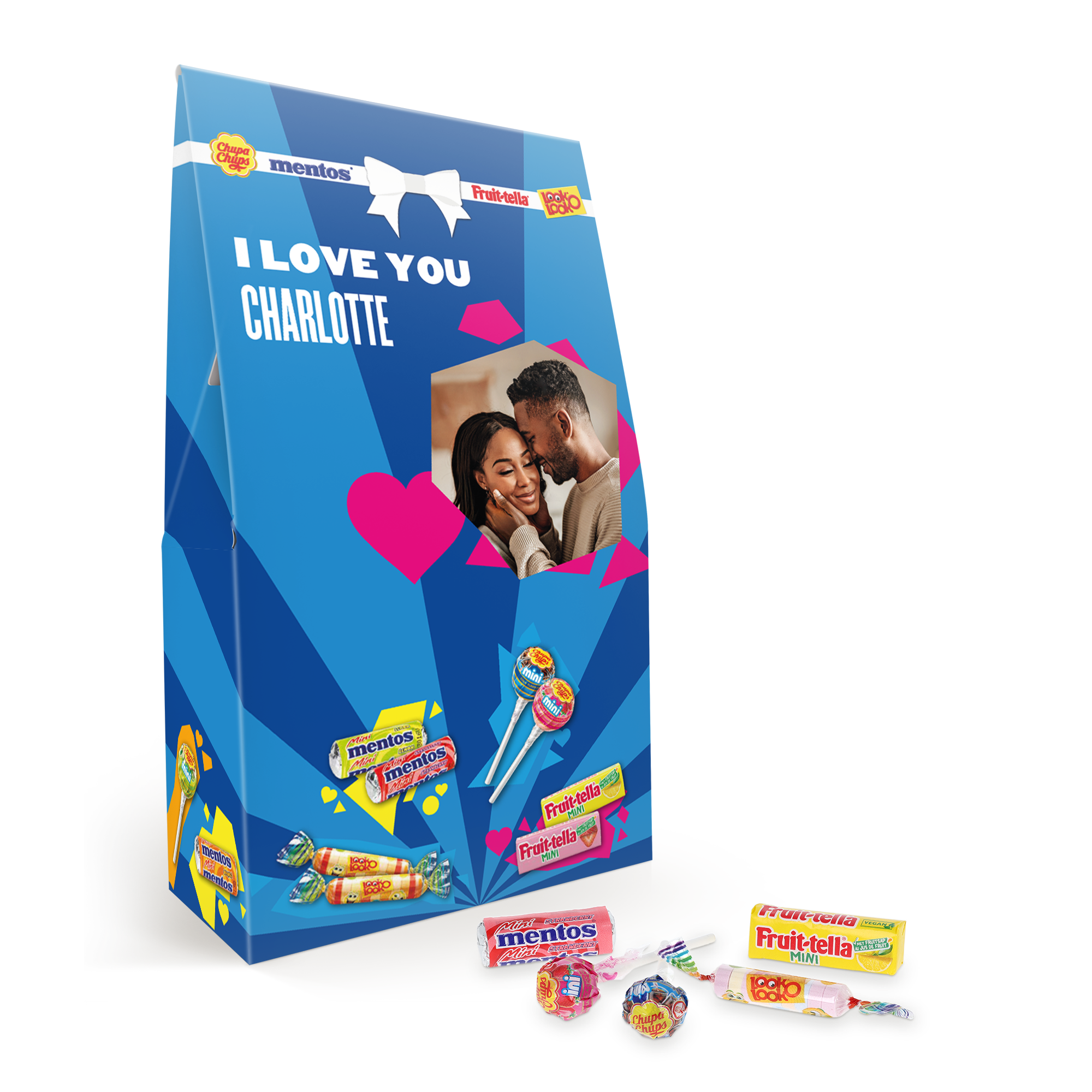 A personalized Fruit-tella candy mix with a photo of a couple and "I LOVE YOU CHARLOTTE" printed on the blue box.