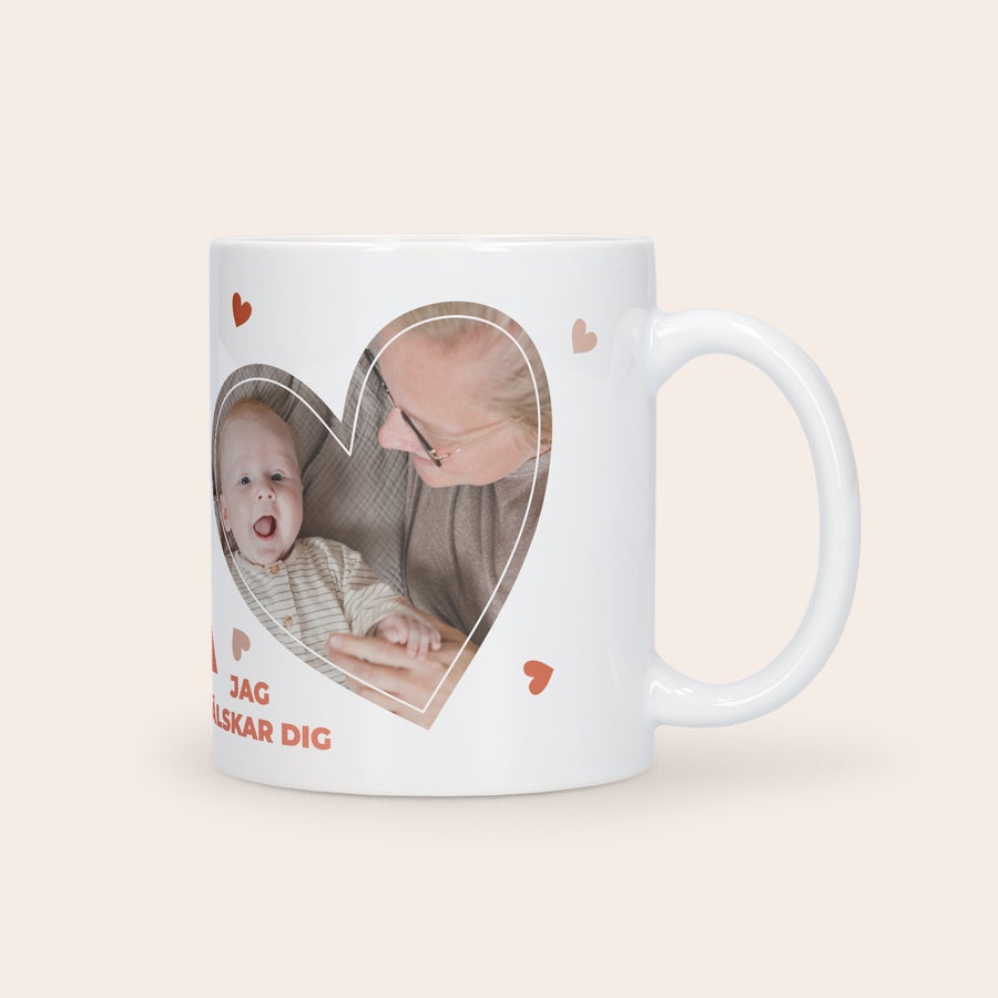 Mugg med foto - Mors dag Mors dag mugg med foto på ett barn och en vuxen i ett hjärta och texten "Jag älskar dig" under, tryckt på en vit mugg