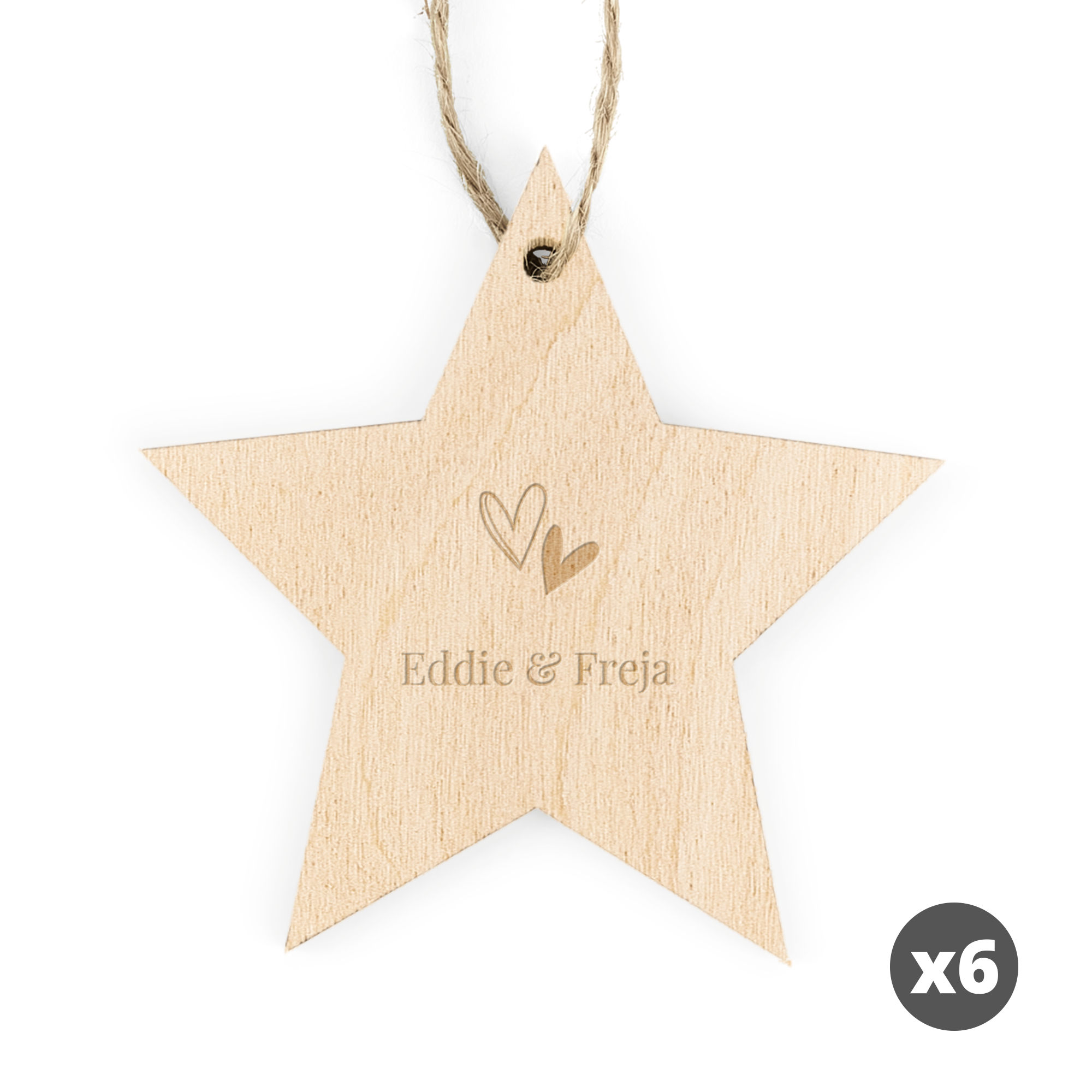 Graverad julstjärnad dekoration i trä