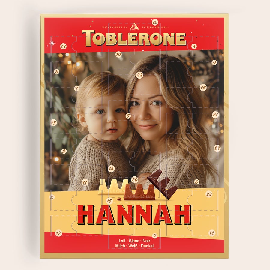 Toblerone Adventskalender 2025 Personalisierter Toblerone Adventskalender mit aufgedrucktem Foto einer Frau und einem Kind, dazu der Name Hannah