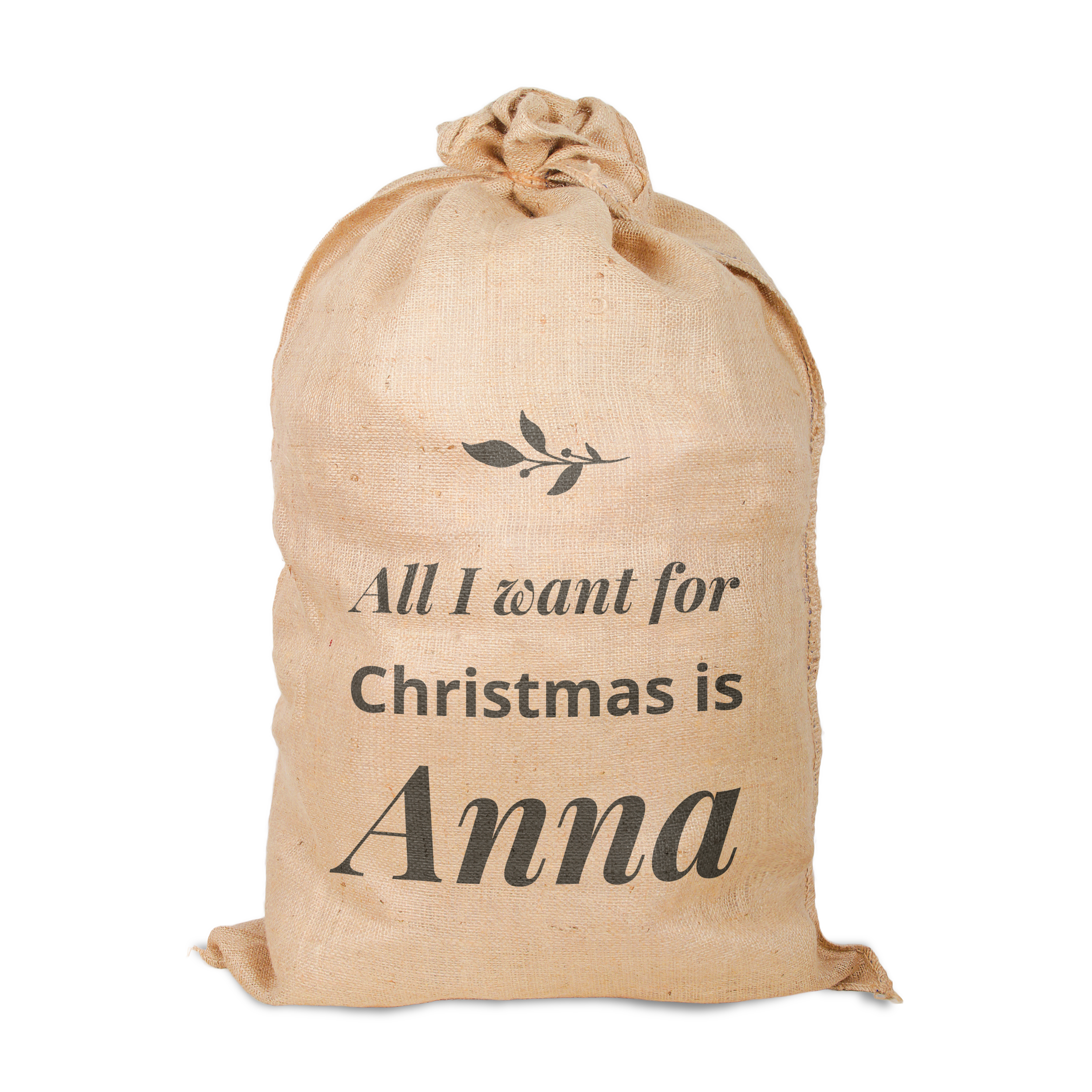 Jutesack "All I want for Christmas is Anna" mit grüner Blätterranke, bedruckt als personalisierter Weihnachtsmann Sack