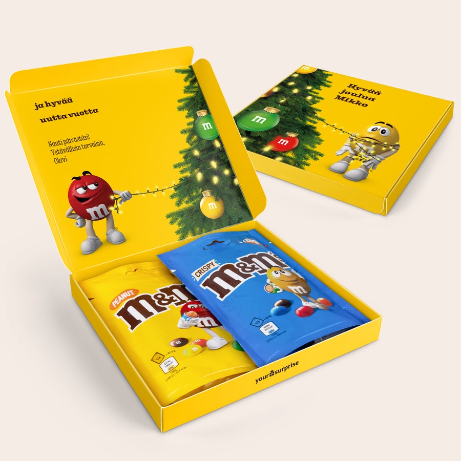 M&M's-suklaalahjapakkaus kuvalla ja/tai tekstillä Personoitu lahjapakkaus M&M's suklaalla omalla painetulla viestillä ja nimellä. Mukana pähkinä- ja Crispy-M&M's.