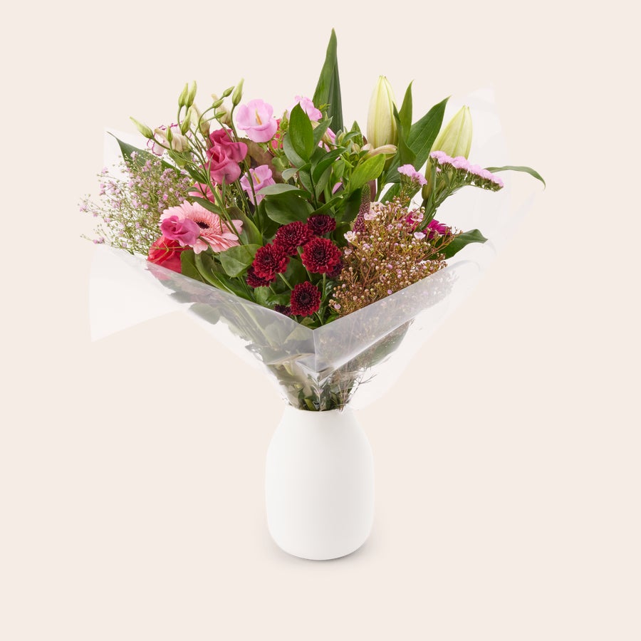 Blumenstrauß Rosa Bunter Blumenstrauß mit Lilien, Gerbera und Eustoma, in Geschenkverpackung mit kostenloser Geschenkkarte geliefert.