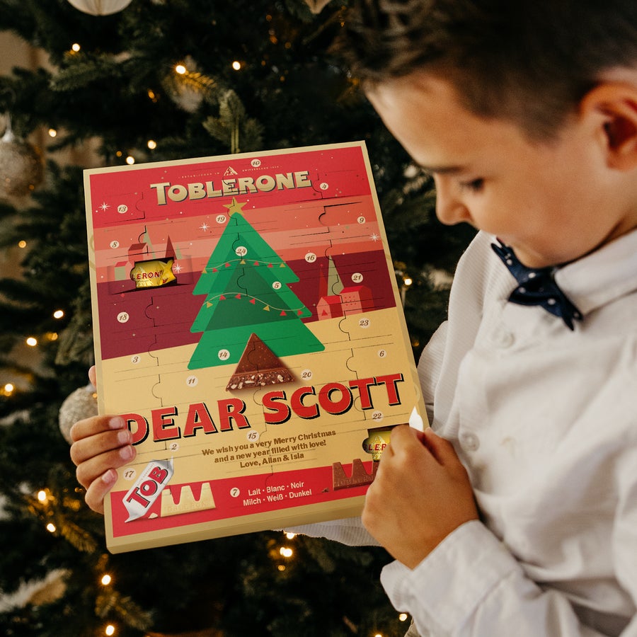 Calendário do Advento - Toblerone 2025 Faça a contagem regressiva para o Natal com calendário do advento Toblerone personalizado com o nome Scott.