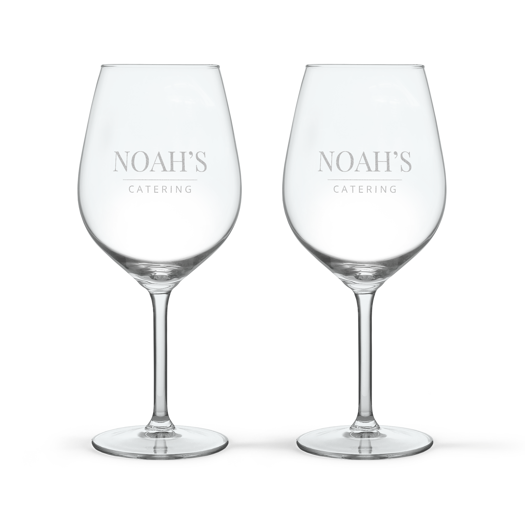 Set of two personalized wine glasses, engraved with the text Noahs Catering.