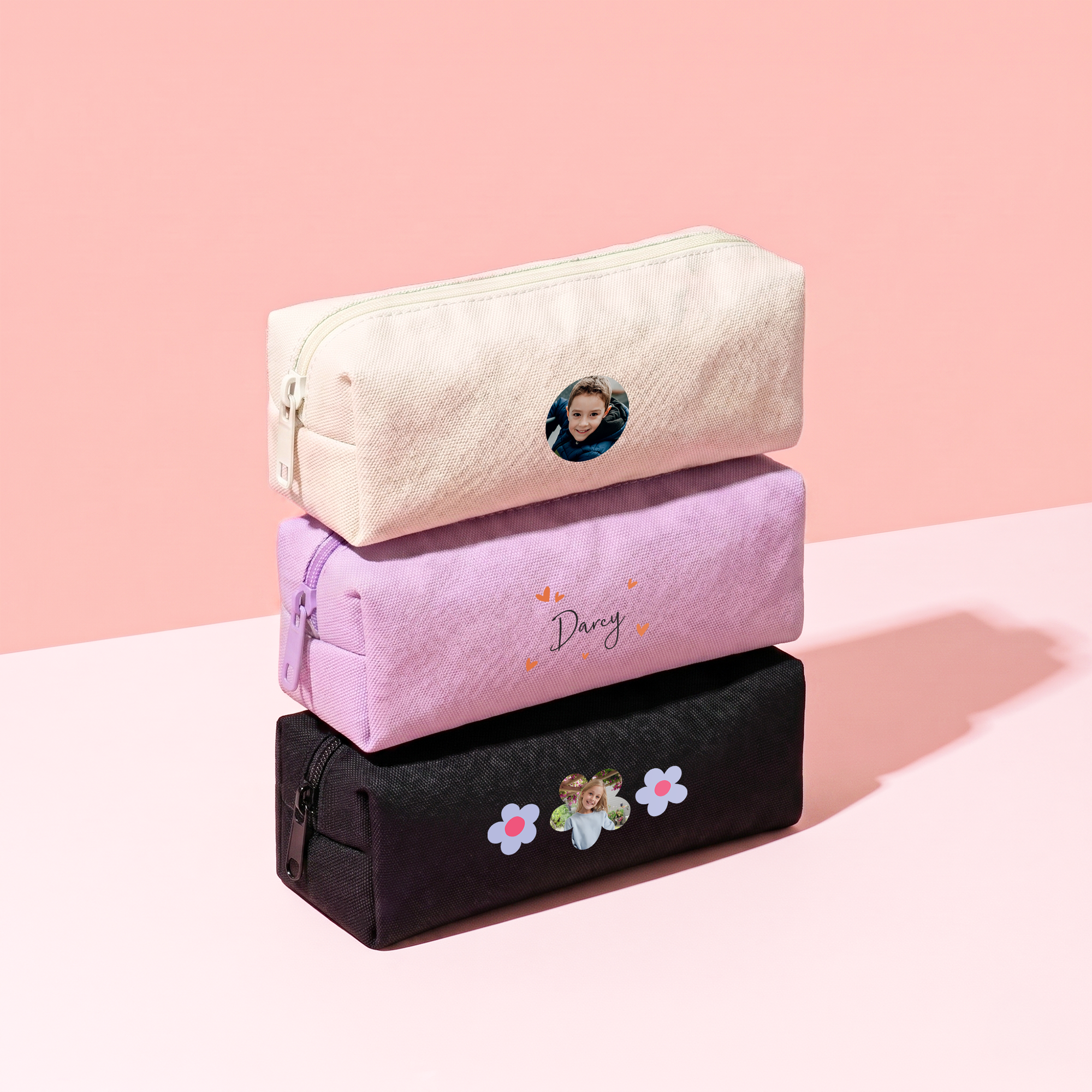 Personalised pencil case - Beige with a custom photo. Also shows lavender and black pencil cases with custom text and designs.