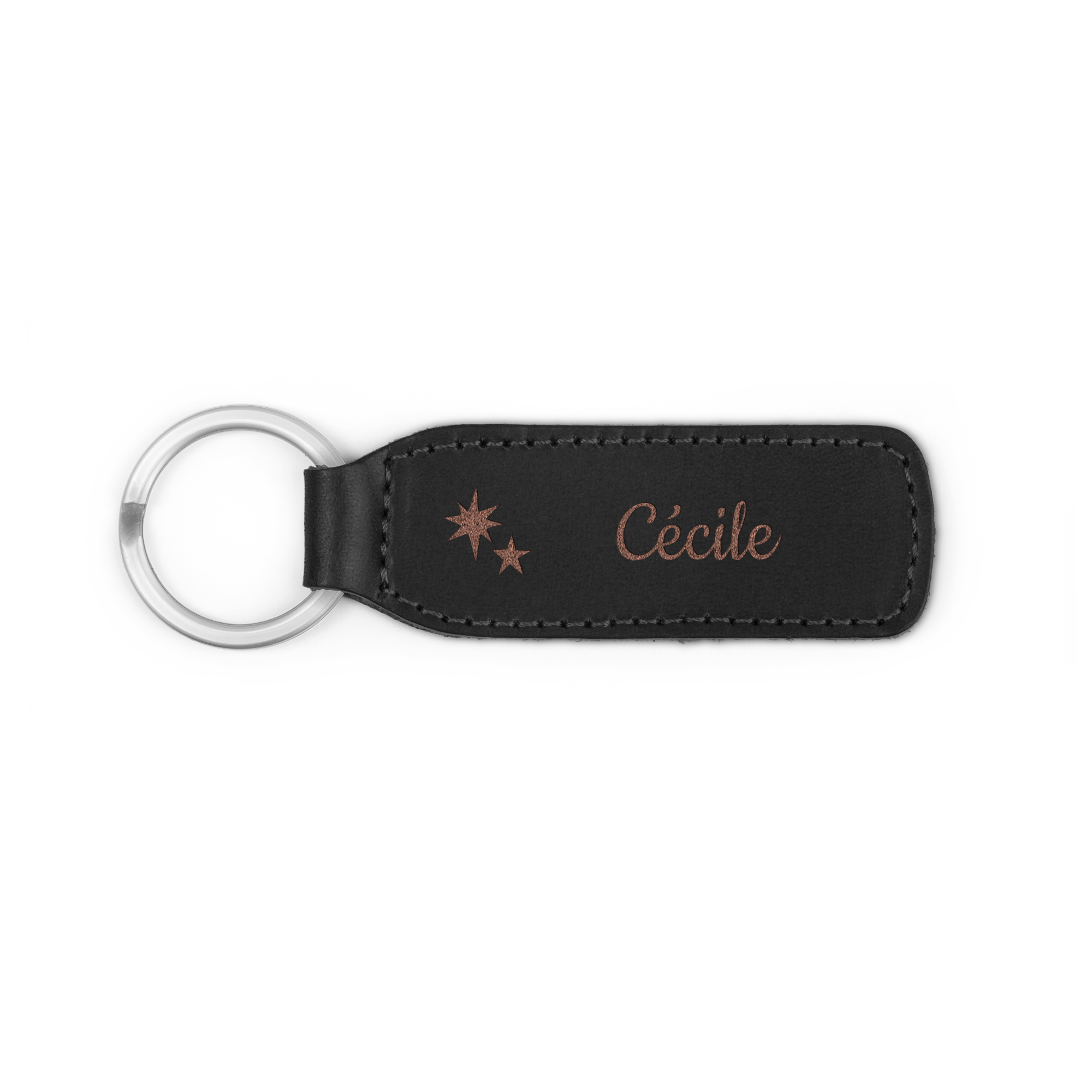 Porte-clé en cuir noir avec le prénom Cécile et deux étoiles gravés au laser