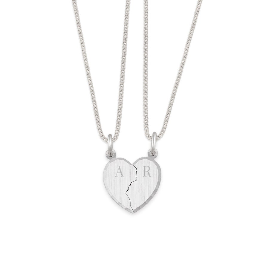 Engraved silver pendant broken heart