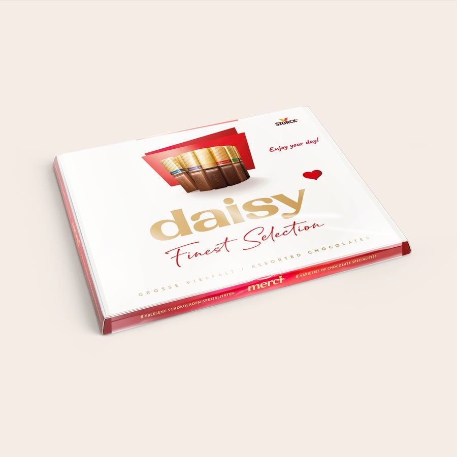 Personalised Merci Chocolate Gift Box & Greeting Card Merci chocolate with personalised card - 250 grams featuring "Daisy" on the box, customized with text "Enjoy your day!" and a red heart.