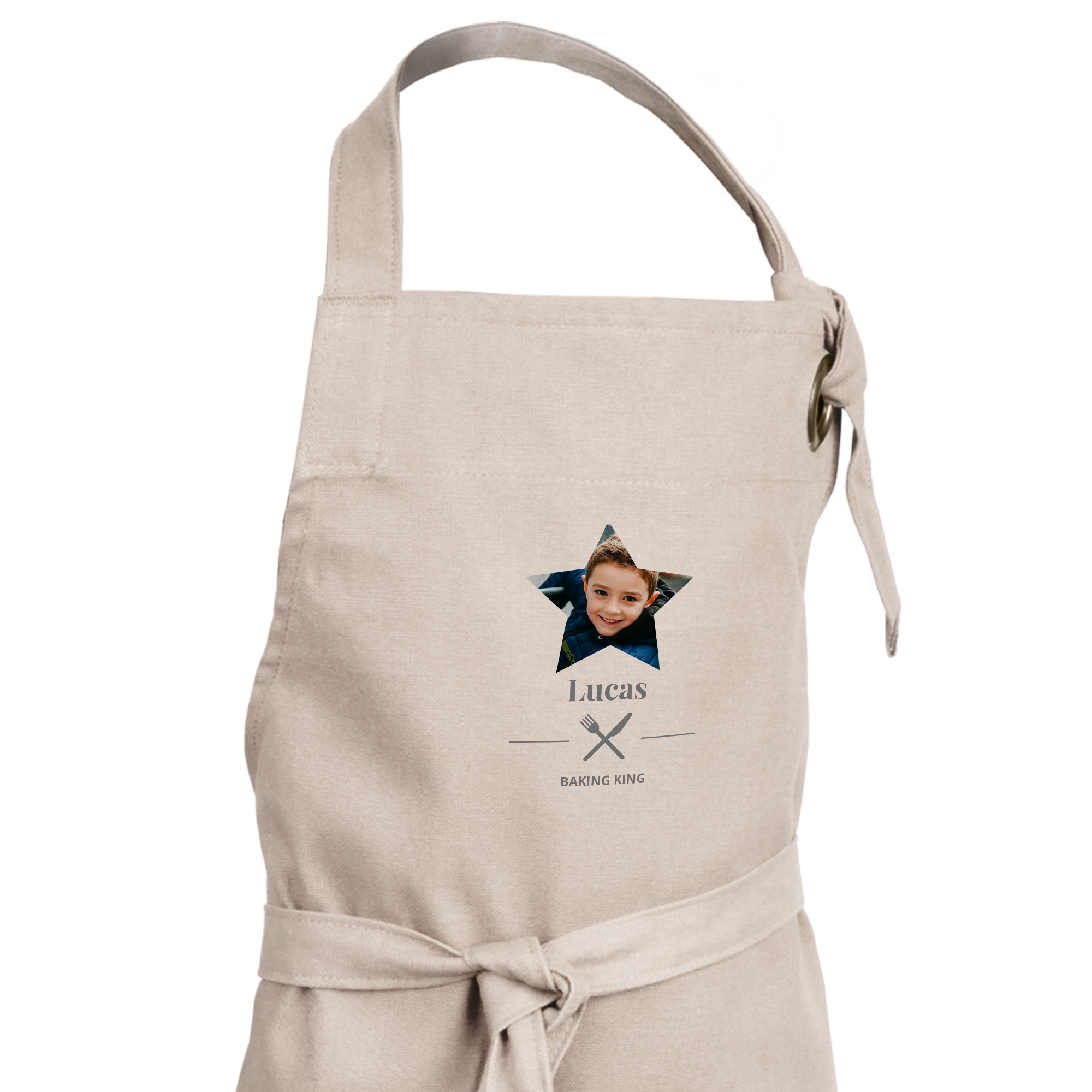 Delantal de niño beige con foto de Lucas en estrella y el texto Baking King.