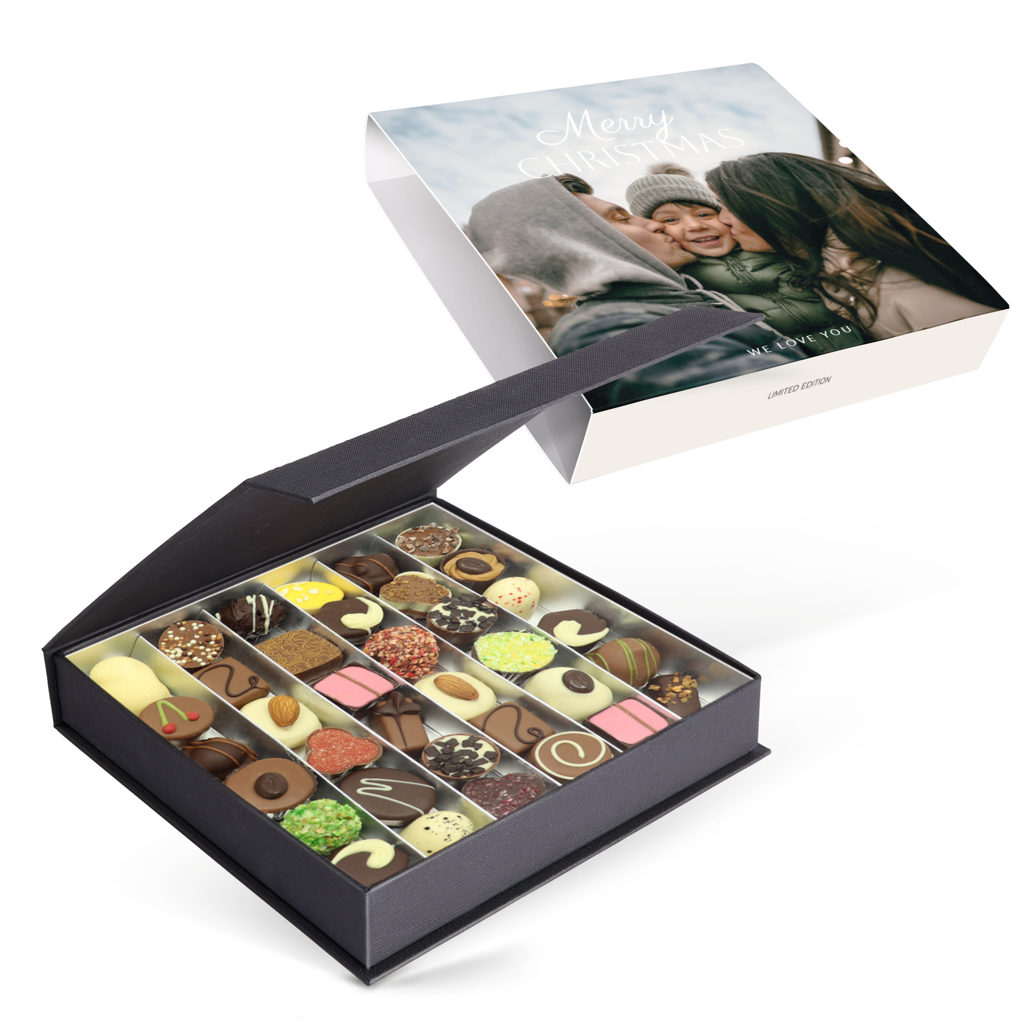 Chocolates navideños personalizados en caja negra, con foto impresa de familia y texto "Merry Christmas" en la funda.