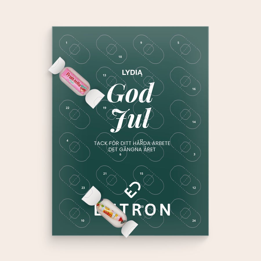 Personlig adventskalender med sötsaker Personlig adventskalender med sötsaker och texten God Jul tryckt med namnet Lydia