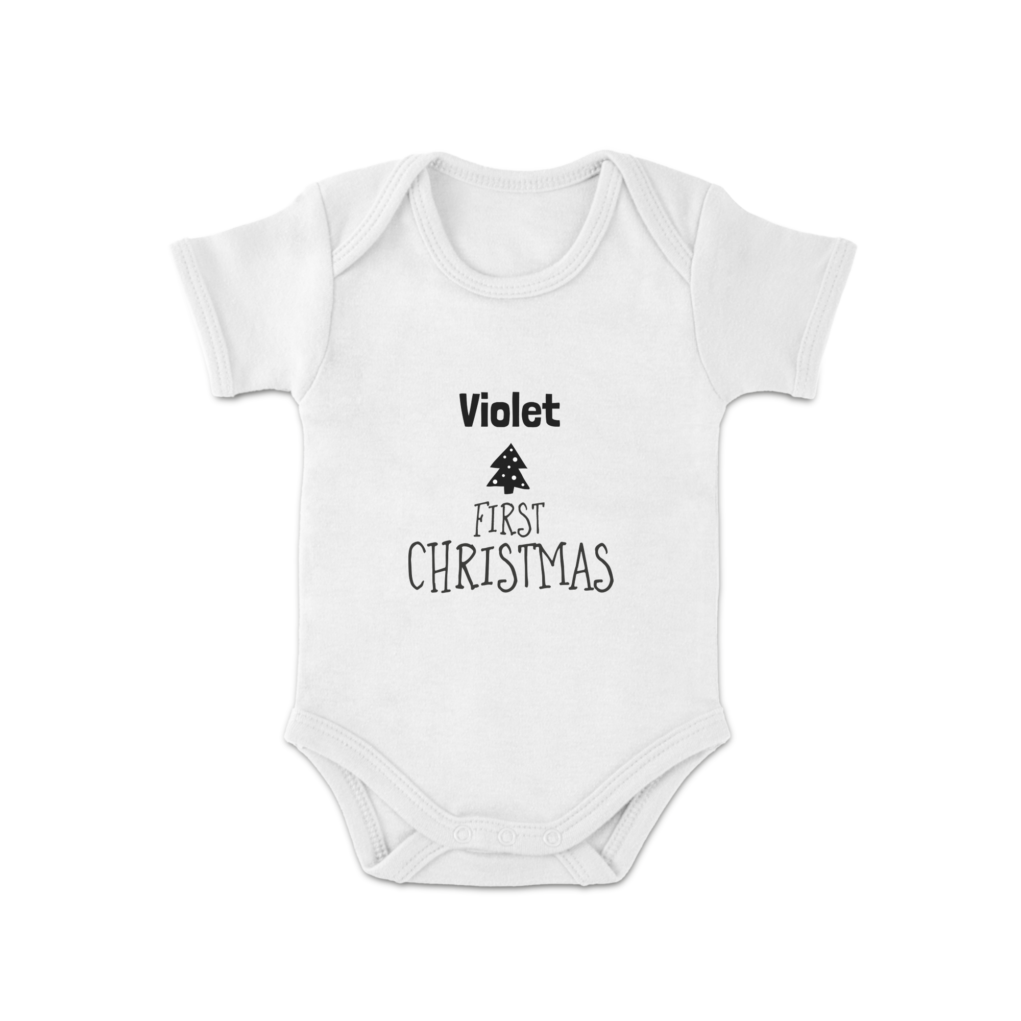 Body blanco de manga corta, estampado con el nombre "Violet" y "First Christmas" junto a un árbol de Navidad.