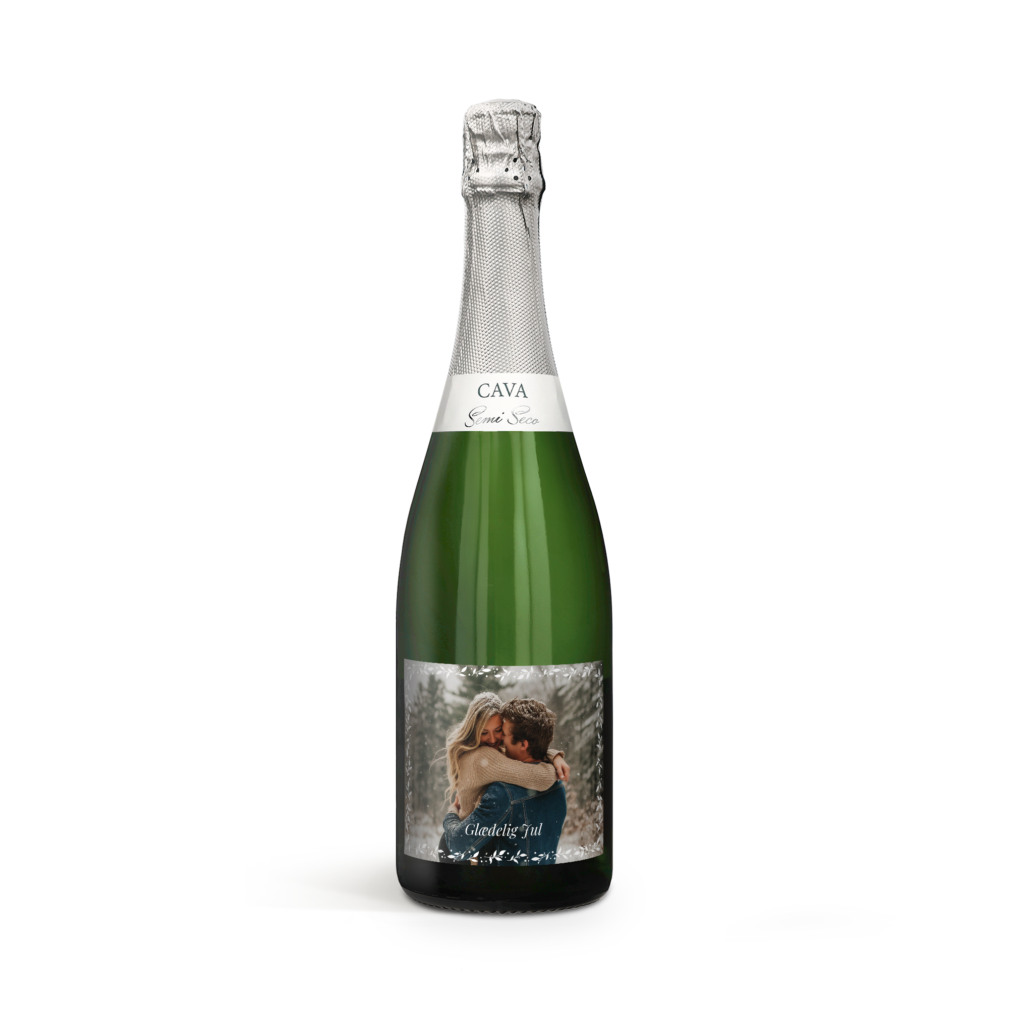 En lækker flaske Cava Palau Semi Sec med en personlig etikette, trykt med et billede af et par og teksten Glædelig Jul.
