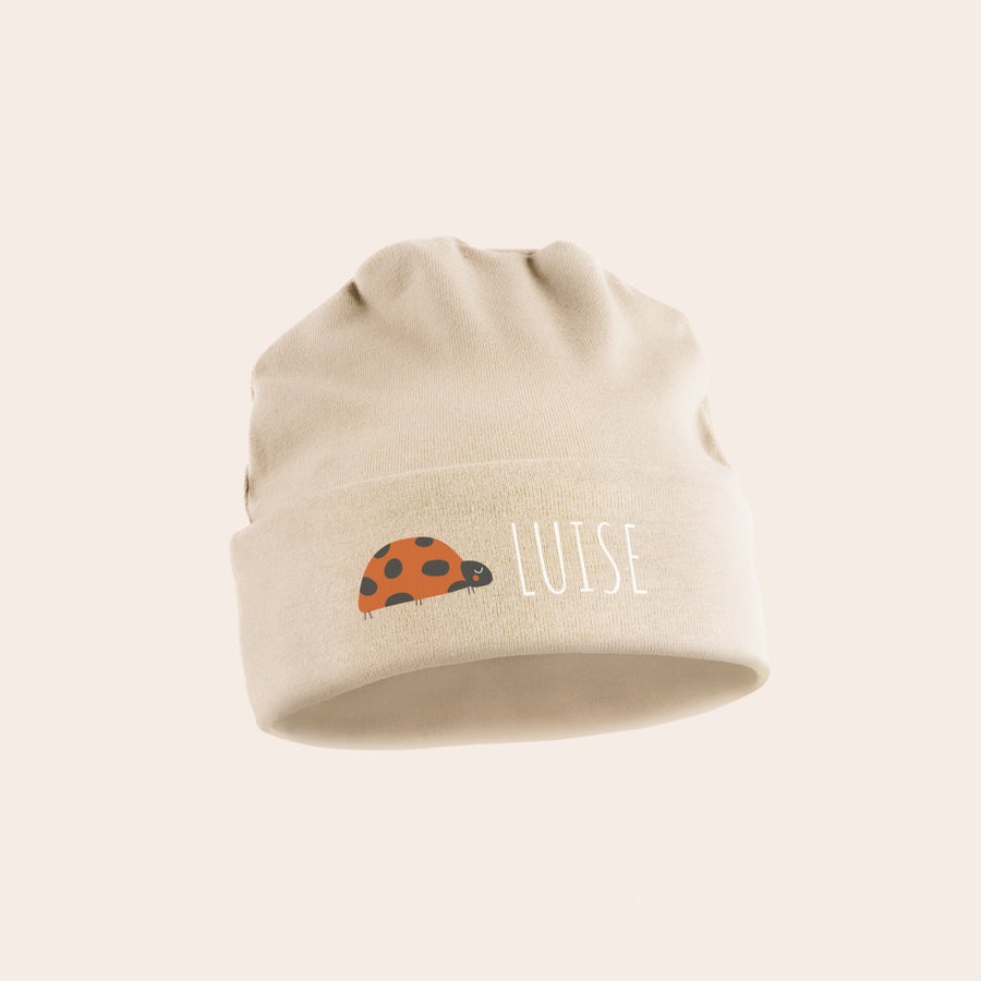 Babymütze mit Namen Personalisierte Babymütze bedruckt mit dem Namen Luise und einem süßen Marienkäfer Design