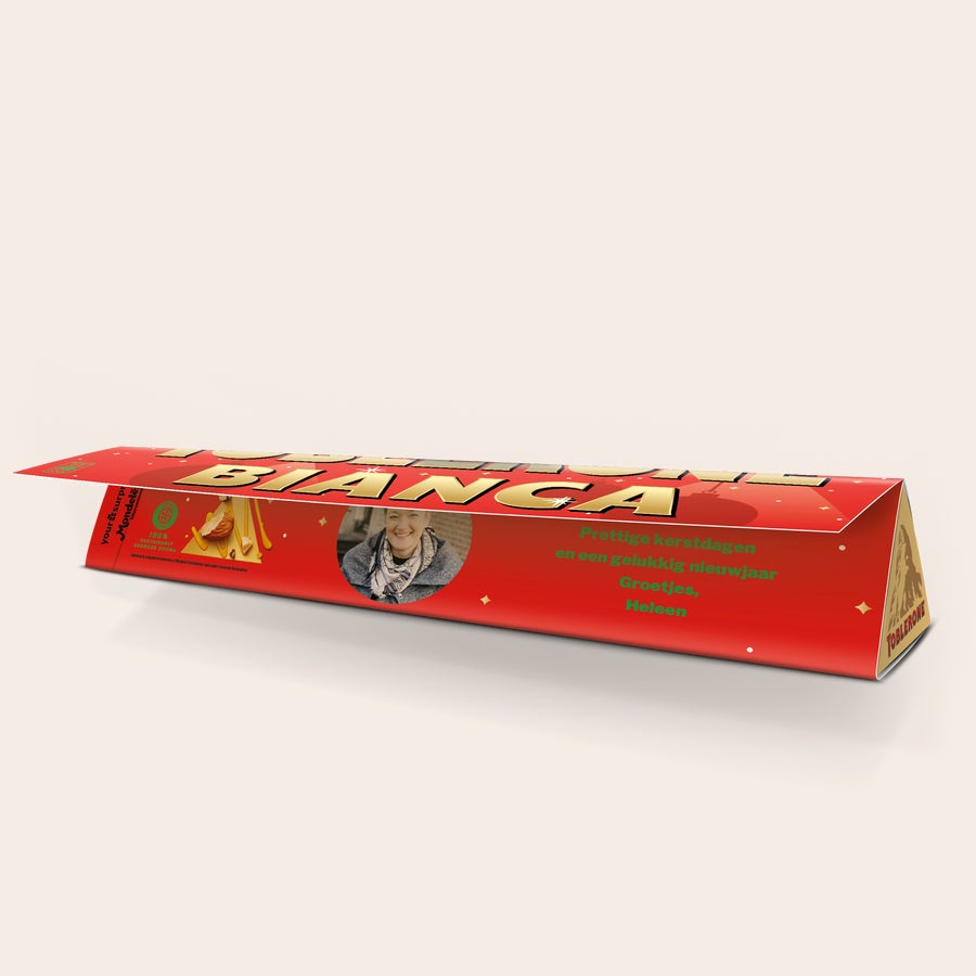 Toblerone kerst met naam Rode Toblerone kerstreep met de naam Bianca en een foto van een vrouw, geprint met een kerstboodschap.