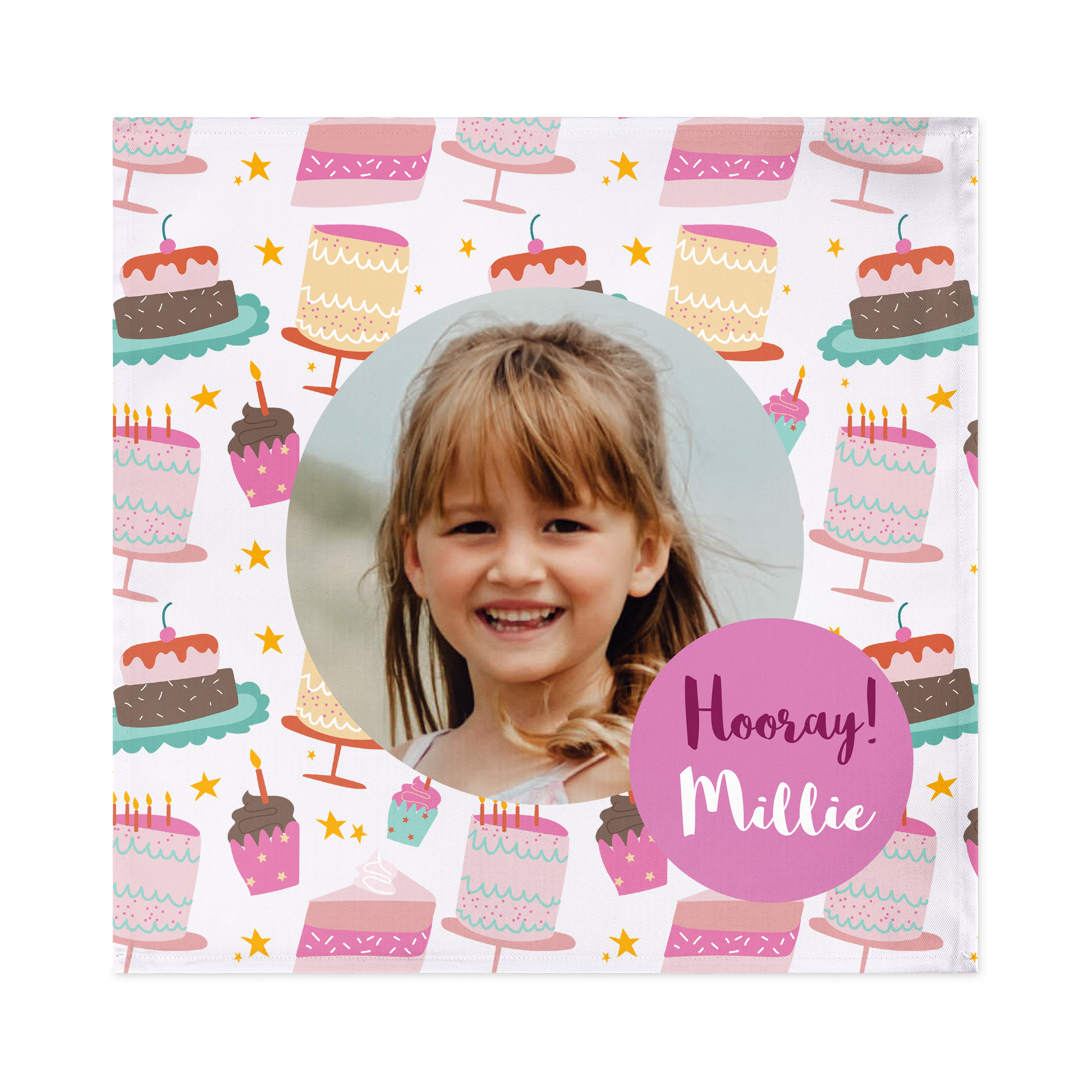 Personalised napkin printed with a child's photo and birthday cakes. Hooray Millie text in a pink circle.
