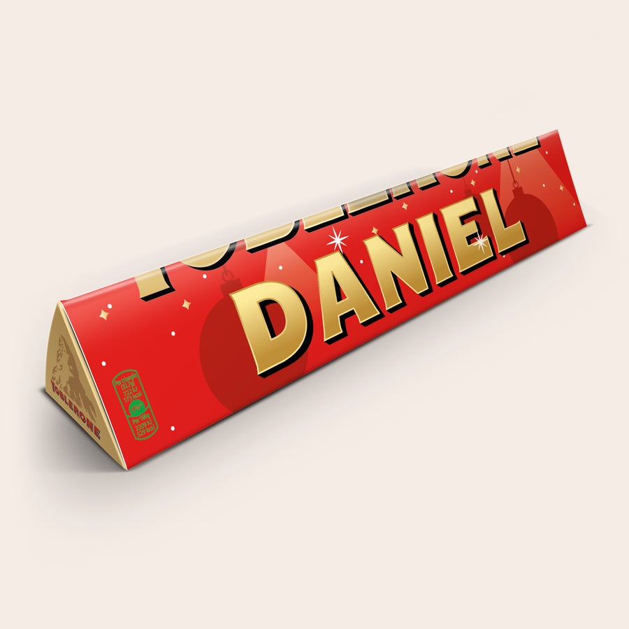 Toblerone Personalizzato - Natale Confezione regalo Toblerone natalizia personalizzata con il nome Daniel in oro e stampa Metti un Toblerone sotto l'albero di Natale
