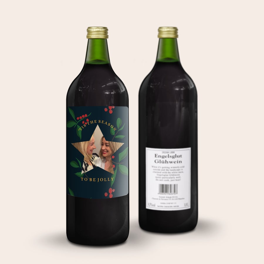 Personalziowany grzaniec Engelsglut Butelka glühwein z etykietą ze zdjęciem dwóch kobiet i tekstem Tis The Season To Be Jolly