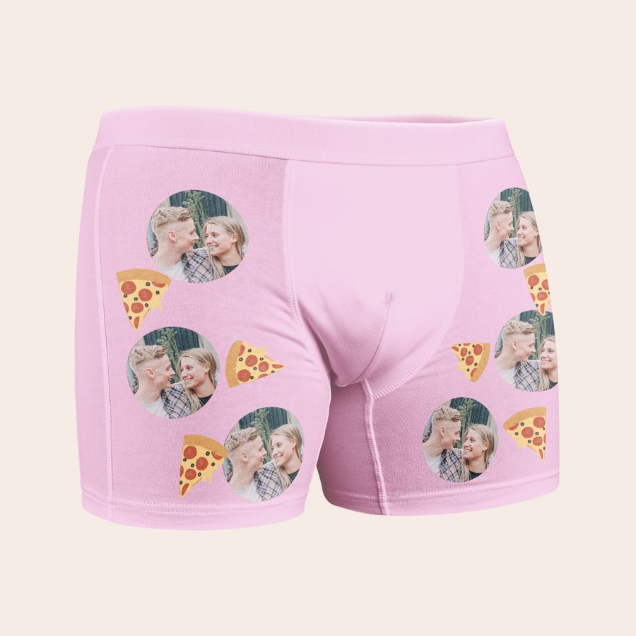 Personalised boxer shorts Pink personalized boxershort with photo prints of a couple and pizza slices.