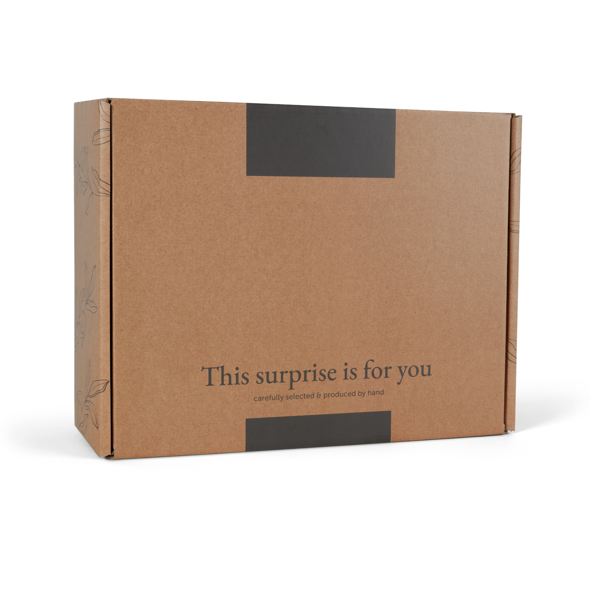 Barna doboz "This surprise is for you" felirattal, ami személyre szabott borcsomagot rejt borospoharakkal