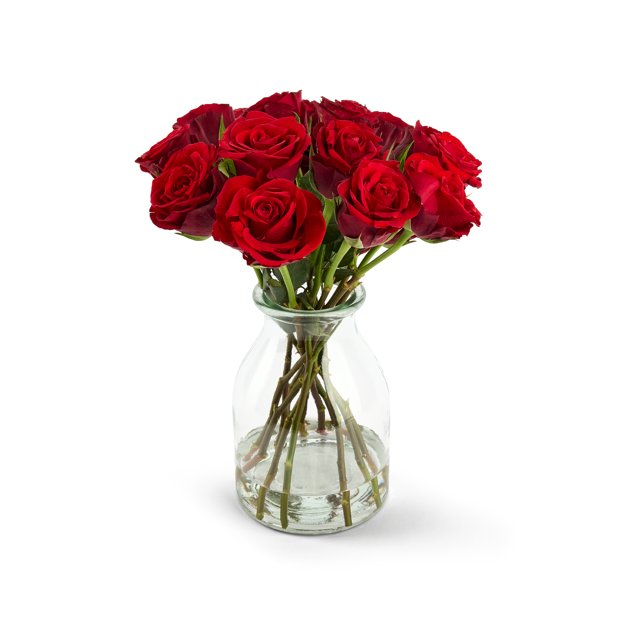 Bouquet de roses postales rouges dans un vase en verre.
