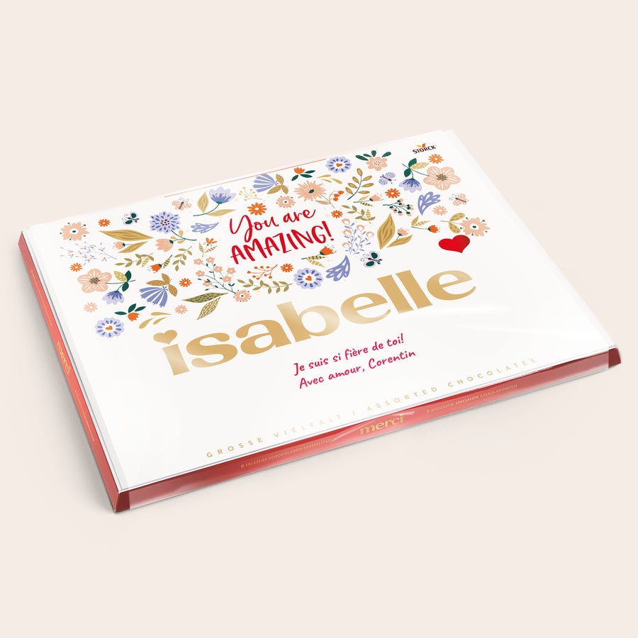 Chocolat Merci Finest Selection avec carte de vœux Mélange de chocolats Merci Finest Selection avec carte personnalisée - 675 grammes avec le prénom Isabelle imprimé et un message floral