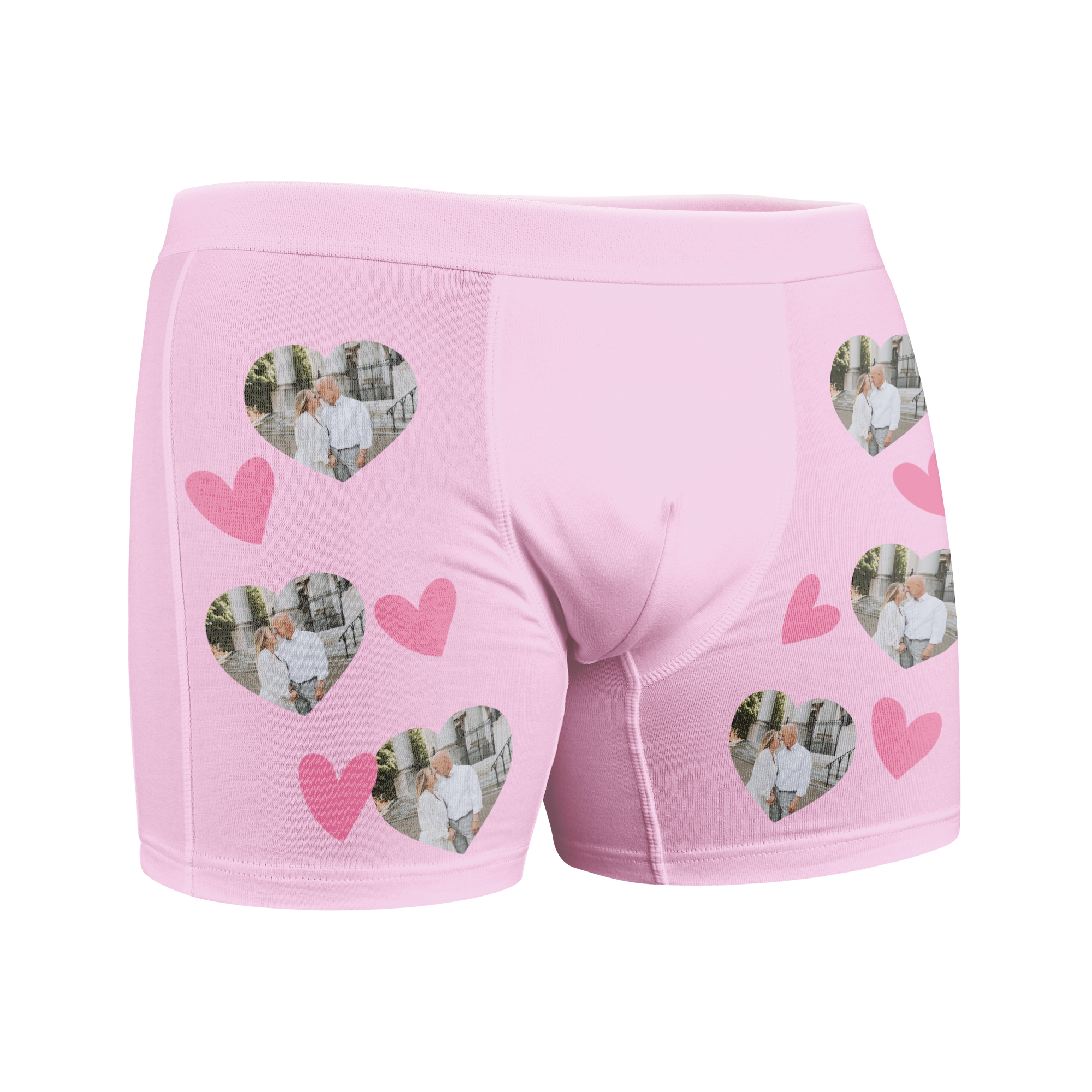 Rožnati personalizirani bokserji s ponavljajočimi se fotografijami para v srčkih in rožnatimi srčki, potiskani z zabavnim vzorcem.