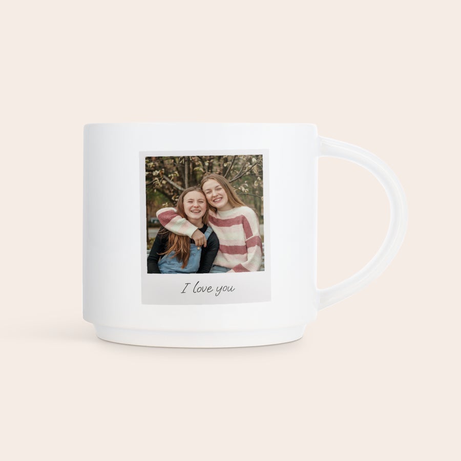 Stackable mugs with photo White stackable photo mug printed with a picture of two smiling girls and "I love you" text. Start your day with memories on this personalized mug.