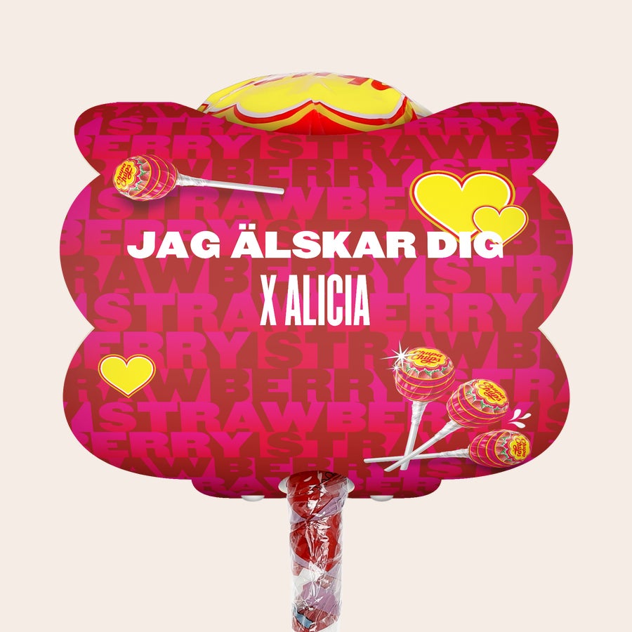 Mega Chupa Chups - personlig Personlig Mega Chupa Chups - Jordgubb - 20 klubbor med texten "JAG ÄLSKAR DIG X ALICIA" tryckt på.