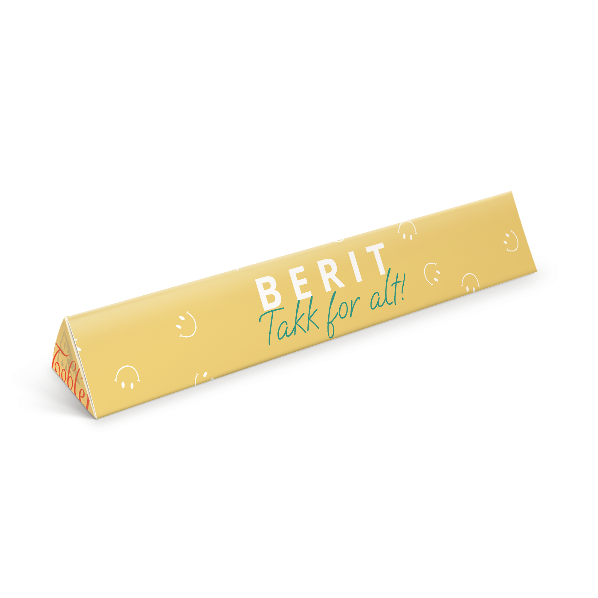 En personlig Toblerone sjokoladebar med "BERIT Takk for alt!" trykt på den gule innpakningen.
