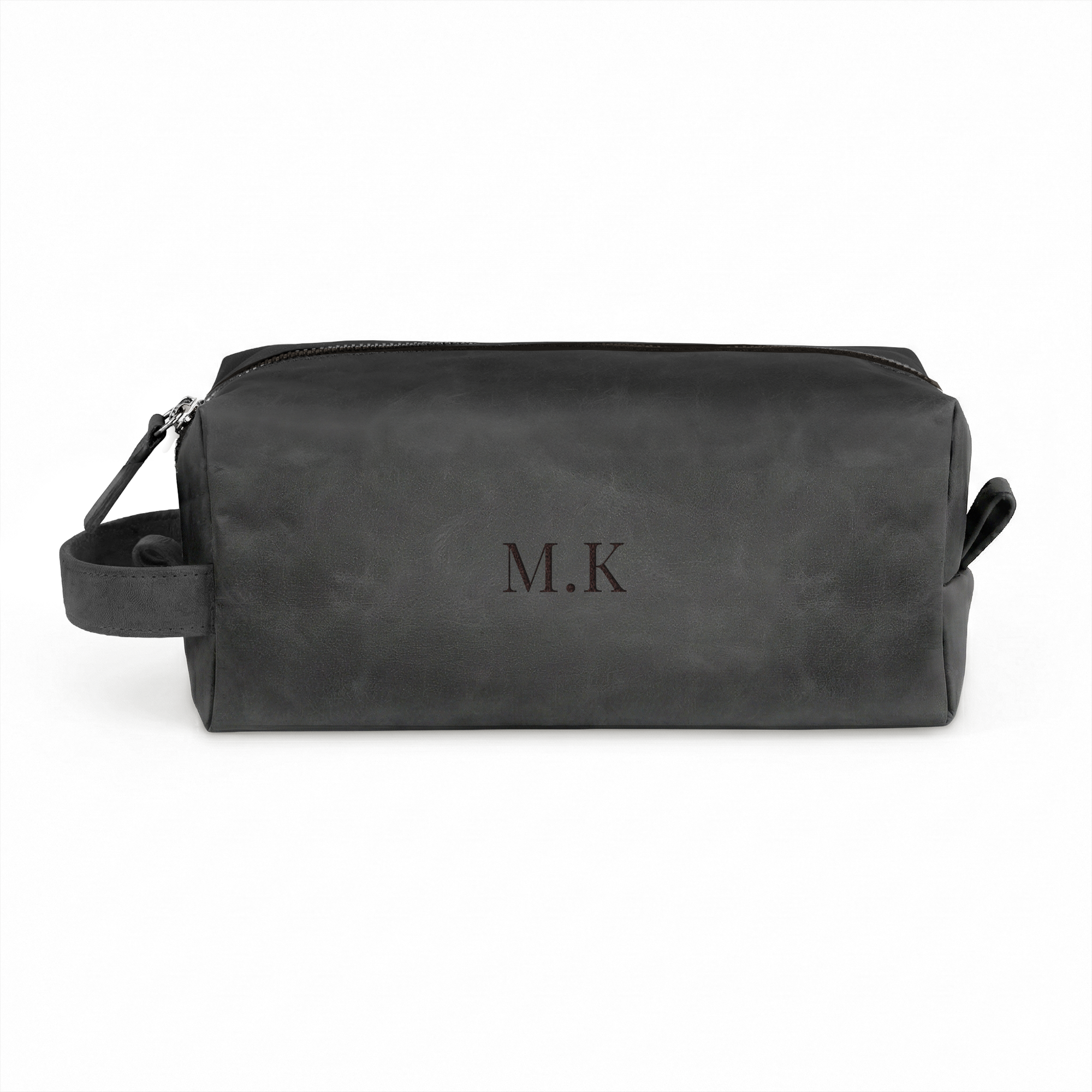 Kaiverrettu nahkainen toalettilaukku