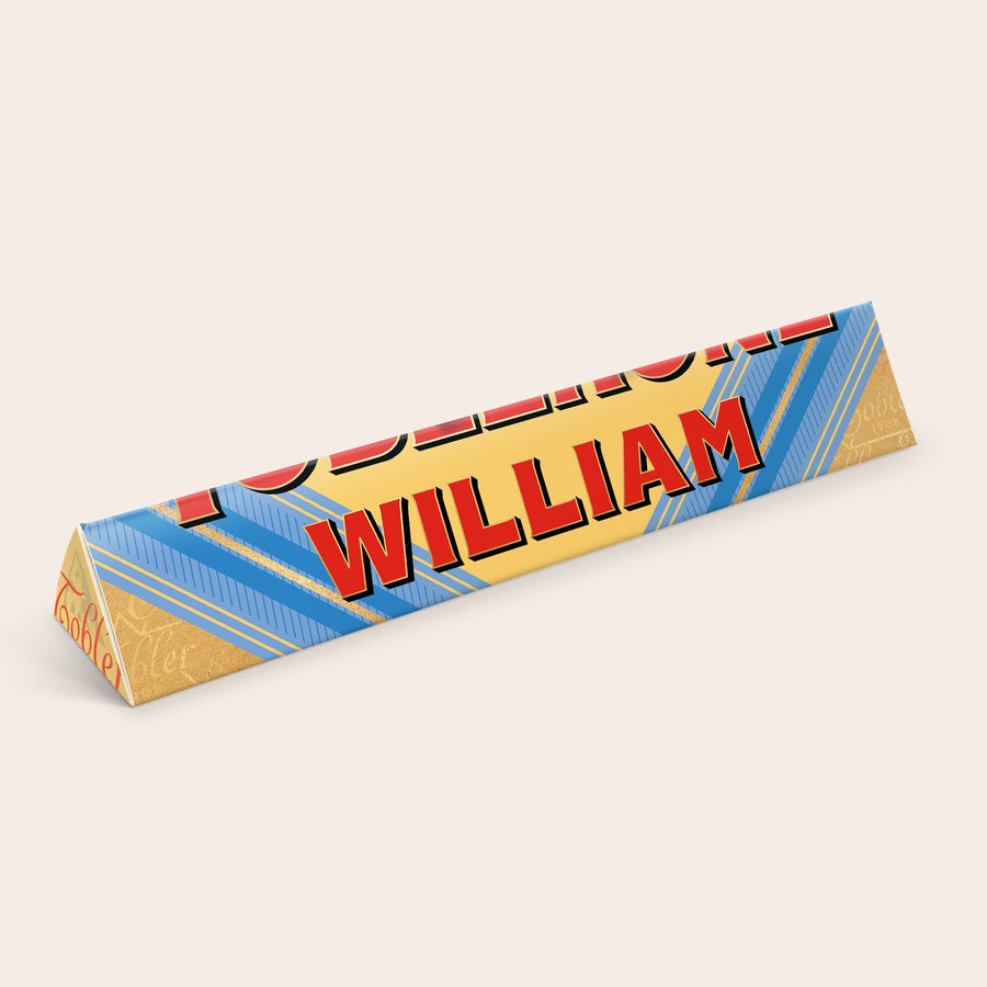 Personlig Toblerone - Farsdag Personlig Toblerone-sjokolade til å overraske faren din med, trykt med navn William i rødt.