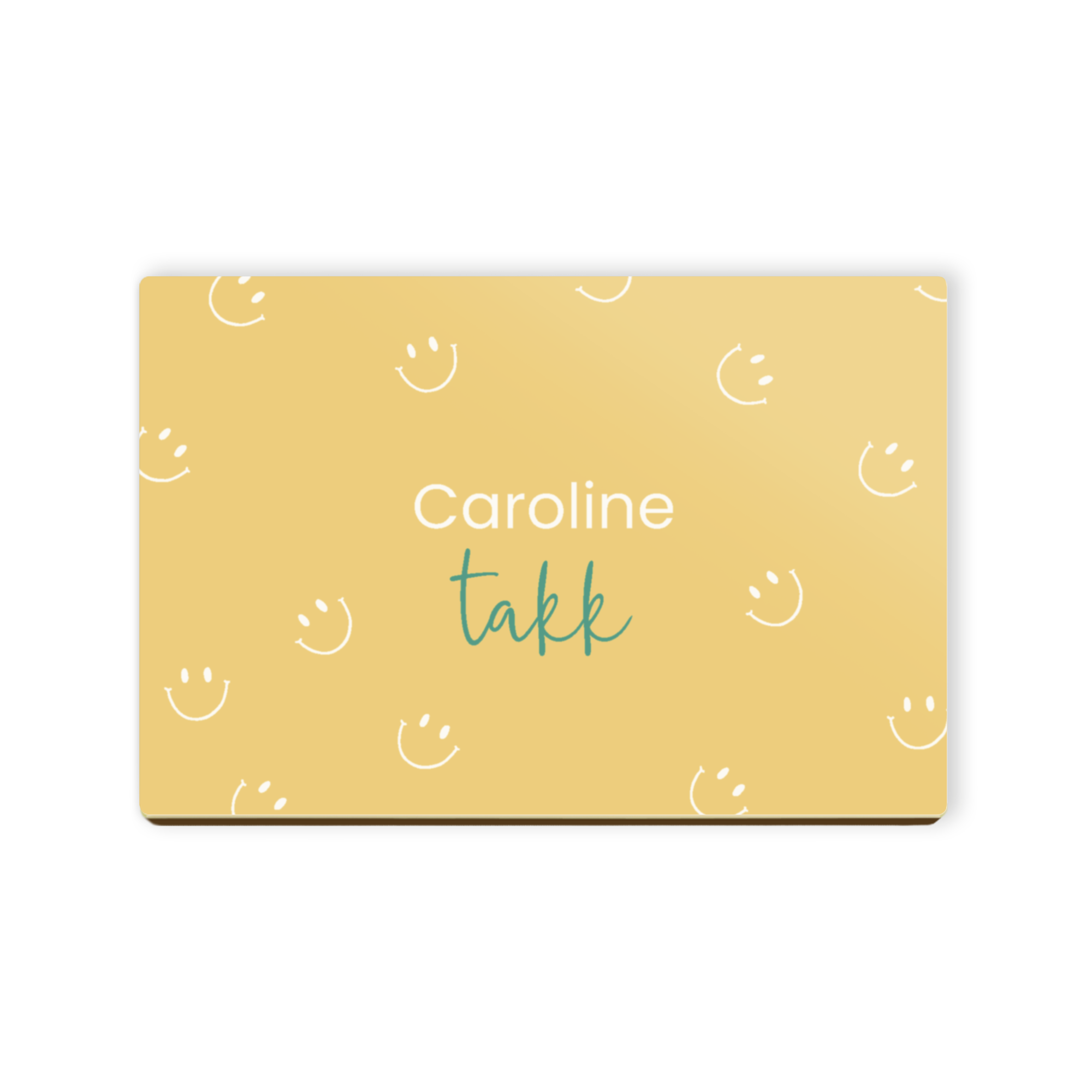 Personlig sjokoladebrev med navnet Caroline og ordet takk i grønt, omgitt av smilefjes, gjør vanlig sjokolade til en ekstraordinær gave.