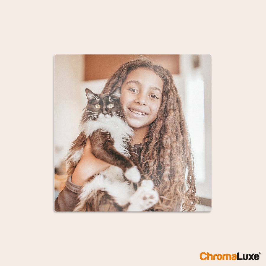Aluminium photo panel Chromaluxe aluminium photo print of a smiling girl holding a black and white cat, custom printed with your favorite memories.